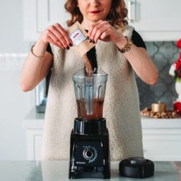 woman using a blender 