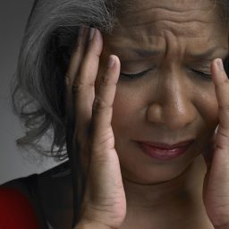 woman suffering from a dizzy episode