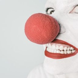 clown with a large red nose 