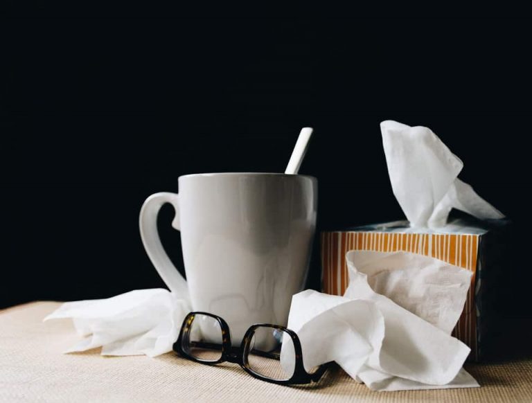 Glasses, tissues and a coffee mug.