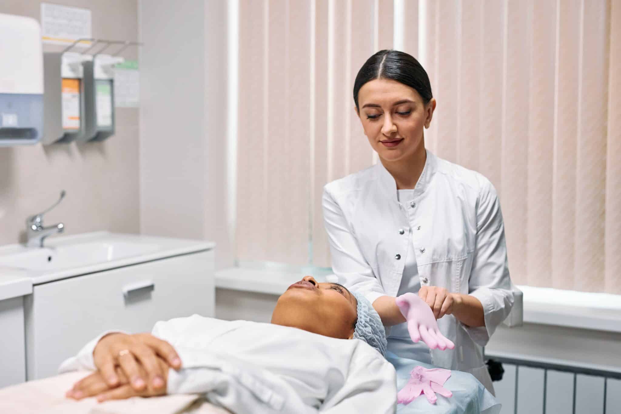 A medical provider examining a patient.