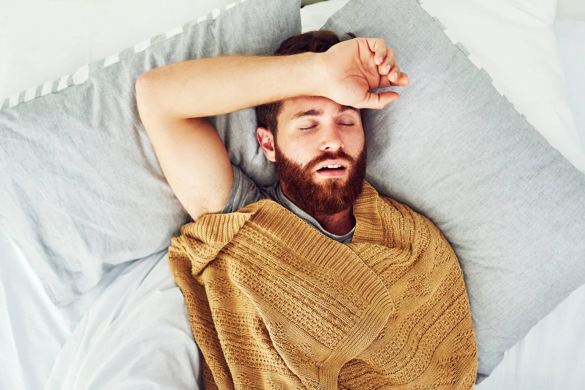 Young man snoring.