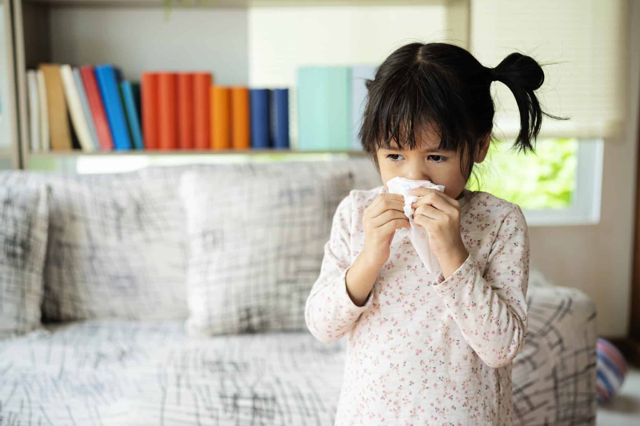 Little girl with a runny nose.