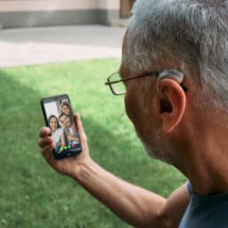 Man enjoys benefits of hearing aids